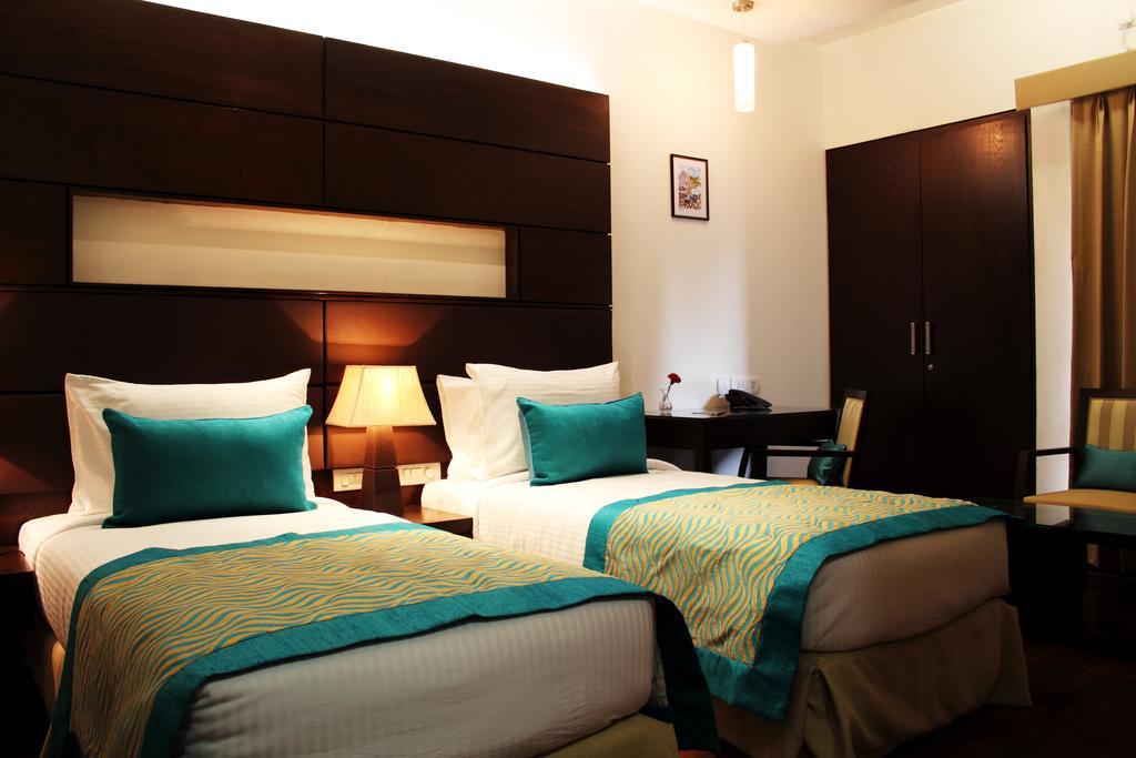 Stately Suites Mg Road Gurgaon Room photo